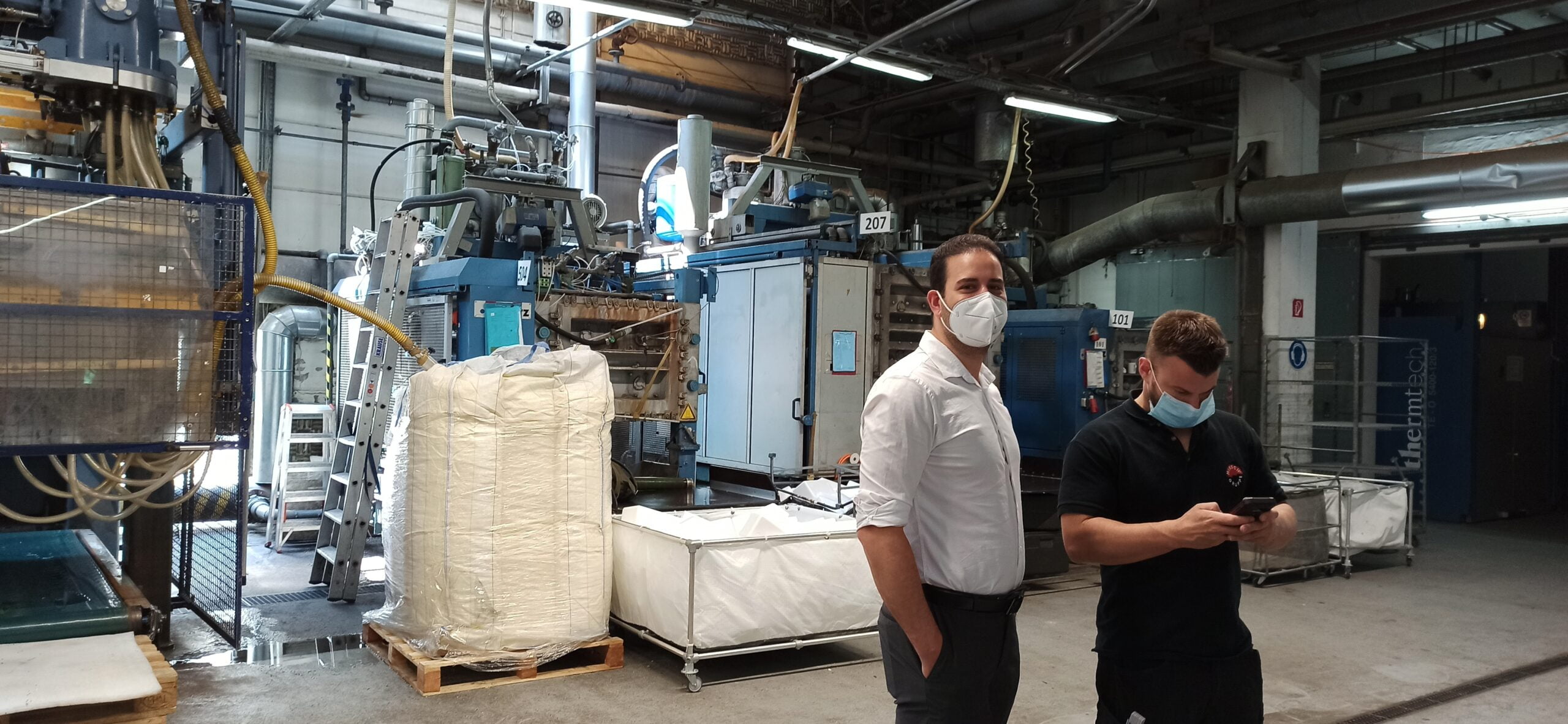 Akram at a factory